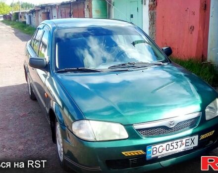 Зеленый Мазда 323, объемом двигателя 1.5 л и пробегом 237 тыс. км за 2500 $, фото 1 на Automoto.ua