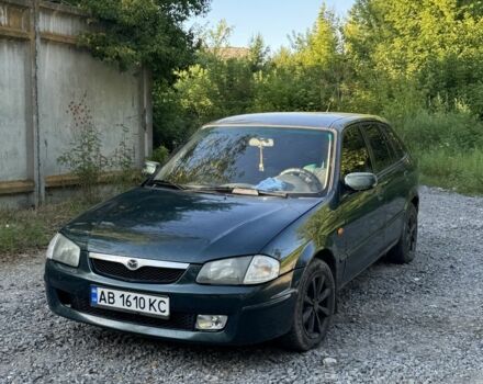 Зелений Мазда 323, об'ємом двигуна 2 л та пробігом 324 тис. км за 1850 $, фото 1 на Automoto.ua