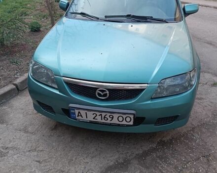 Зеленый Мазда 323, объемом двигателя 1.6 л и пробегом 370 тыс. км за 900 $, фото 1 на Automoto.ua