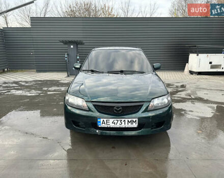 Зеленый Мазда 323, объемом двигателя 1.6 л и пробегом 230 тыс. км за 3000 $, фото 1 на Automoto.ua