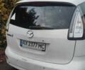 Белый Мазда 5, объемом двигателя 2 л и пробегом 247 тыс. км за 6000 $, фото 1 на Automoto.ua