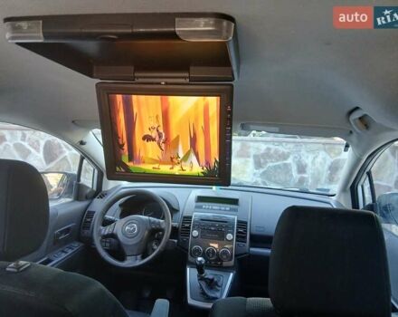 Білий Мазда 5, об'ємом двигуна 2 л та пробігом 279 тис. км за 5800 $, фото 1 на Automoto.ua