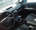 Білий Мазда 5, об'ємом двигуна 2 л та пробігом 203 тис. км за 5250 $, фото 1 на Automoto.ua
