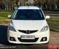 Белый Мазда 5, объемом двигателя 2 л и пробегом 177 тыс. км за 5999 $, фото 1 на Automoto.ua
