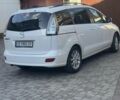 Білий Мазда 5, об'ємом двигуна 2 л та пробігом 240 тис. км за 7000 $, фото 1 на Automoto.ua