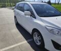 Белый Мазда 5, объемом двигателя 1.6 л и пробегом 143 тыс. км за 9600 $, фото 1 на Automoto.ua