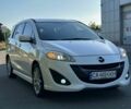 Белый Мазда 5, объемом двигателя 2.49 л и пробегом 137 тыс. км за 8800 $, фото 1 на Automoto.ua