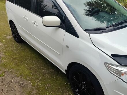 Белый Мазда 5, объемом двигателя 2 л и пробегом 180 тыс. км за 6000 $, фото 1 на Automoto.ua