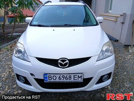 Белый Мазда 5, объемом двигателя 2 л и пробегом 277 тыс. км за 5900 $, фото 1 на Automoto.ua