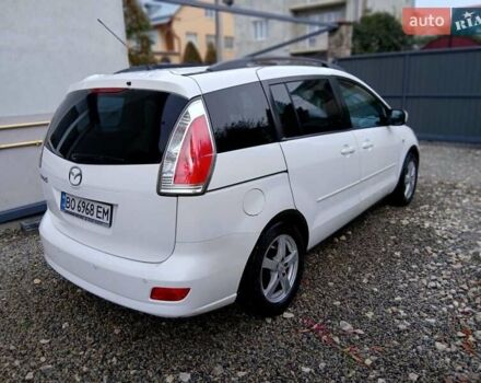 Белый Мазда 5, объемом двигателя 2 л и пробегом 277 тыс. км за 5900 $, фото 1 на Automoto.ua
