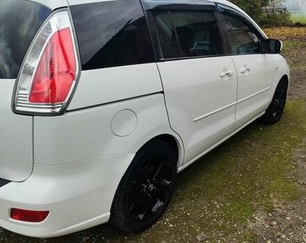 Белый Мазда 5, объемом двигателя 2 л и пробегом 180 тыс. км за 6000 $, фото 1 на Automoto.ua