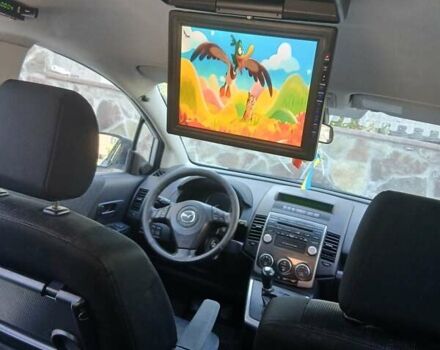 Білий Мазда 5, об'ємом двигуна 2 л та пробігом 279 тис. км за 5800 $, фото 1 на Automoto.ua