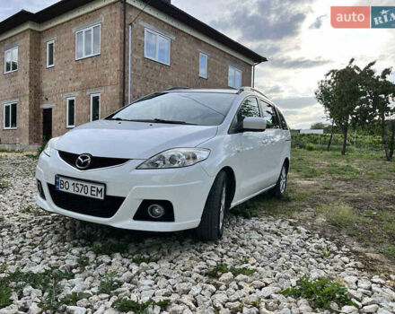 Белый Мазда 5, объемом двигателя 2 л и пробегом 175 тыс. км за 7000 $, фото 1 на Automoto.ua