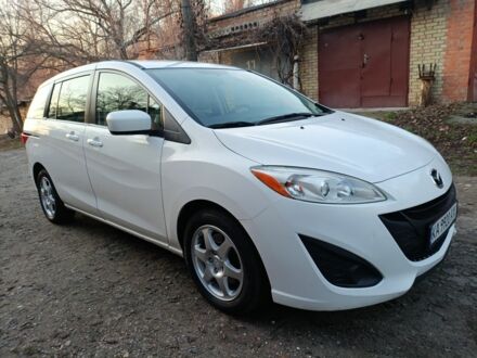 Белый Мазда 5, объемом двигателя 2.5 л и пробегом 107 тыс. км за 6750 $, фото 1 на Automoto.ua