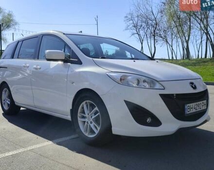 Белый Мазда 5, объемом двигателя 1.6 л и пробегом 143 тыс. км за 9600 $, фото 1 на Automoto.ua