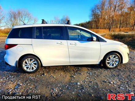 Белый Мазда 5, объемом двигателя 1.6 л и пробегом 18100 тыс. км за 8200 $, фото 1 на Automoto.ua