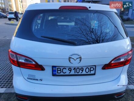 Белый Мазда 5, объемом двигателя 2.49 л и пробегом 138 тыс. км за 9499 $, фото 1 на Automoto.ua