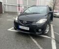 Черный Мазда 5, объемом двигателя 2 л и пробегом 235 тыс. км за 4096 $, фото 1 на Automoto.ua