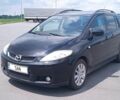 Черный Мазда 5, объемом двигателя 2 л и пробегом 285 тыс. км за 4400 $, фото 1 на Automoto.ua
