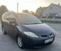 Чорний Мазда 5, об'ємом двигуна 2 л та пробігом 321 тис. км за 4200 $, фото 1 на Automoto.ua