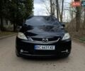 Черный Мазда 5, объемом двигателя 1.8 л и пробегом 260 тыс. км за 4000 $, фото 1 на Automoto.ua