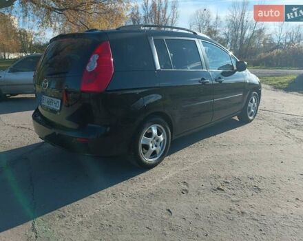 Черный Мазда 5, объемом двигателя 2 л и пробегом 218 тыс. км за 5200 $, фото 21 на Automoto.ua