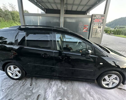 Чорний Мазда 5, об'ємом двигуна 2 л та пробігом 250 тис. км за 4400 $, фото 3 на Automoto.ua