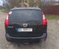 Черный Мазда 5, объемом двигателя 1.8 л и пробегом 255 тыс. км за 2500 $, фото 19 на Automoto.ua