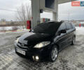 Черный Мазда 5, объемом двигателя 2 л и пробегом 325 тыс. км за 4800 $, фото 1 на Automoto.ua