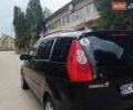 Черный Мазда 5, объемом двигателя 1.8 л и пробегом 260 тыс. км за 4000 $, фото 5 на Automoto.ua