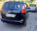 Черный Мазда 5, объемом двигателя 1.8 л и пробегом 199 тыс. км за 4000 $, фото 2 на Automoto.ua
