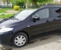 Черный Мазда 5, объемом двигателя 1.8 л и пробегом 245 тыс. км за 3700 $, фото 1 на Automoto.ua