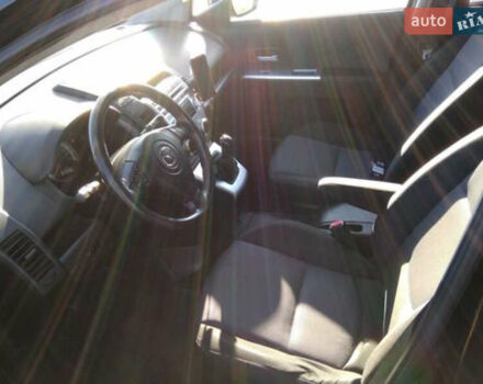 Черный Мазда 5, объемом двигателя 2 л и пробегом 318 тыс. км за 6300 $, фото 4 на Automoto.ua