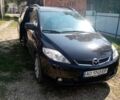 Черный Мазда 5, объемом двигателя 2 л и пробегом 310 тыс. км за 4699 $, фото 1 на Automoto.ua