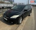 Черный Мазда 5, объемом двигателя 1.8 л и пробегом 256 тыс. км за 4700 $, фото 1 на Automoto.ua