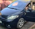 Черный Мазда 5, объемом двигателя 2 л и пробегом 280 тыс. км за 6000 $, фото 1 на Automoto.ua