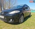 Черный Мазда 5, объемом двигателя 2 л и пробегом 220 тыс. км за 6000 $, фото 1 на Automoto.ua