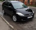 Черный Мазда 5, объемом двигателя 2 л и пробегом 275 тыс. км за 5200 $, фото 1 на Automoto.ua