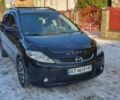 Черный Мазда 5, объемом двигателя 2 л и пробегом 207 тыс. км за 5450 $, фото 1 на Automoto.ua