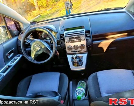 Черный Мазда 5, объемом двигателя 2 л и пробегом 280 тыс. км за 4200 $, фото 5 на Automoto.ua