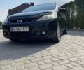 Черный Мазда 5, объемом двигателя 2 л и пробегом 225 тыс. км за 4999 $, фото 1 на Automoto.ua