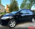 Черный Мазда 5, объемом двигателя 1.8 л и пробегом 200 тыс. км за 5500 $, фото 1 на Automoto.ua