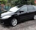 Черный Мазда 5, объемом двигателя 2 л и пробегом 275 тыс. км за 5200 $, фото 1 на Automoto.ua