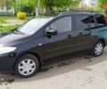 Черный Мазда 5, объемом двигателя 2 л и пробегом 260 тыс. км за 5900 $, фото 1 на Automoto.ua