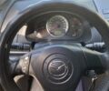 Чорний Мазда 5, об'ємом двигуна 2 л та пробігом 175 тис. км за 6830 $, фото 6 на Automoto.ua