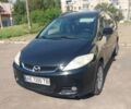 Черный Мазда 5, объемом двигателя 2 л и пробегом 235 тыс. км за 4090 $, фото 1 на Automoto.ua