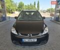 Черный Мазда 5, объемом двигателя 2 л и пробегом 217 тыс. км за 6500 $, фото 1 на Automoto.ua