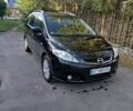 Черный Мазда 5, объемом двигателя 1.8 л и пробегом 318 тыс. км за 3650 $, фото 1 на Automoto.ua