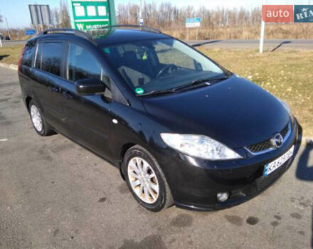 Черный Мазда 5, объемом двигателя 2 л и пробегом 318 тыс. км за 6300 $, фото 1 на Automoto.ua