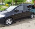 Черный Мазда 5, объемом двигателя 2 л и пробегом 260 тыс. км за 5900 $, фото 1 на Automoto.ua